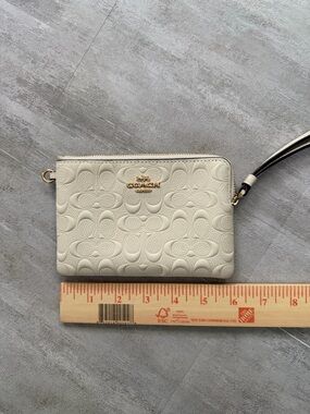 Coach Signature Embossed Wristlet • Light Beige • Excellent Used Condition